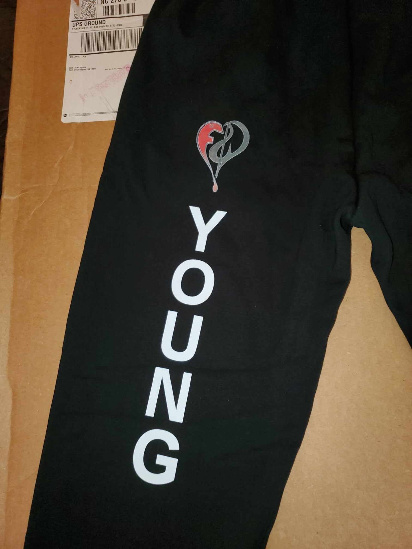 Young & Flawless ™ #1 in the Manifest Series: FARFETCHED? (Sweat suit)